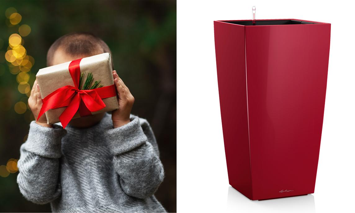 Little boy hiding behind a parcel