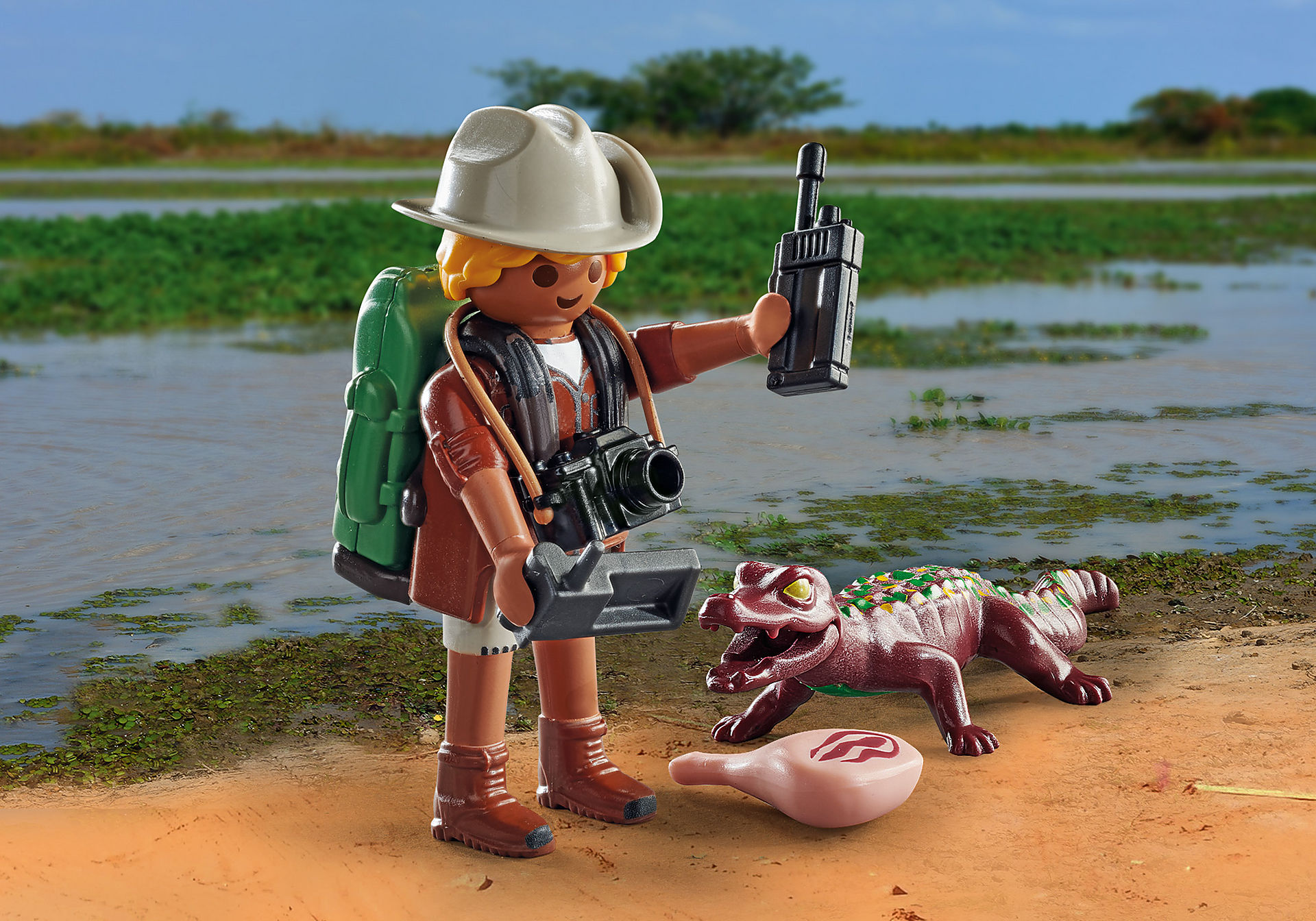 71168 Researcher with young caiman zoom image1