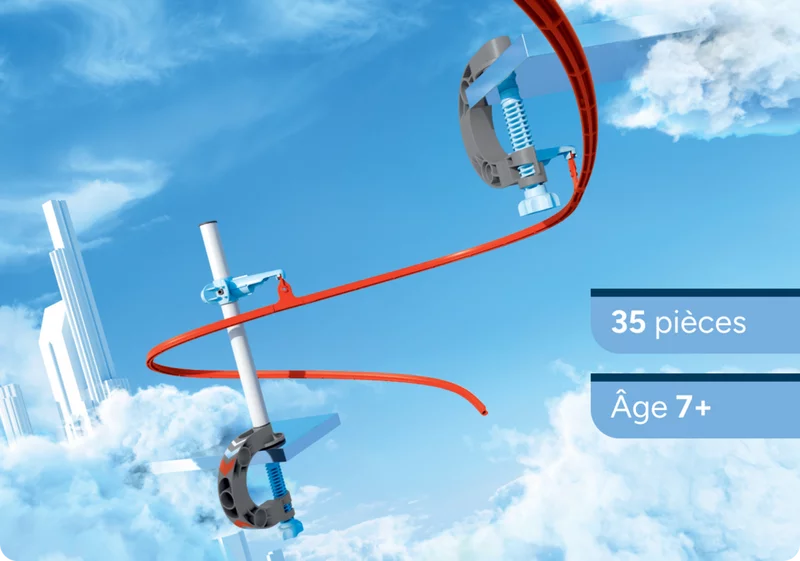 Verbindungsklemmen auf roter Strecke im Himmel. Rote SKY TRAILS Strecke mit Klemmelementen, befestigt an Tischkante und Stützstange ? ideales Konstruktionsspielzeug ab 7 Jahren