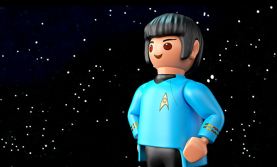 Shows 3D Playmobil Mr. Spock figure in front of a stars background