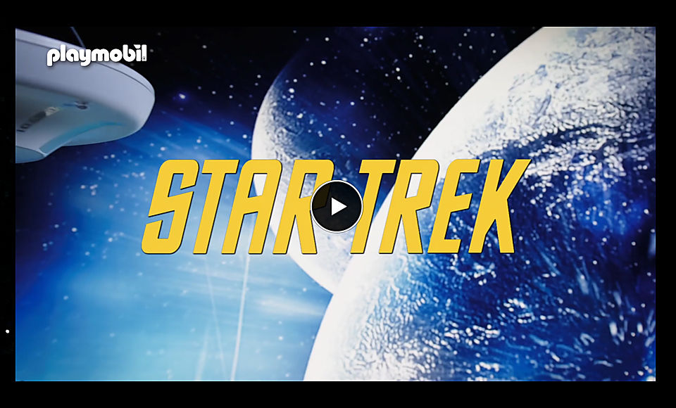 Video screen shows font STAR TREK in front of planets and stars. In the upper left corner you can see a part of the U.S.S. Enterprise NCC-170.
                  Link to external page with promotional video