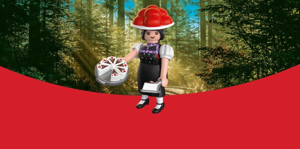 PLAYMOBIL Schwarzwald Heritage Bundle featuring Schwarzwald Marie in traditional Black Forest attire with Black Forest cake in a forest setting.